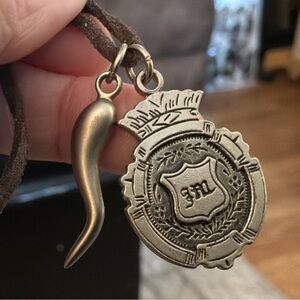 Juicy Couture Silver-Tone Medallion Necklace with Horn Charm